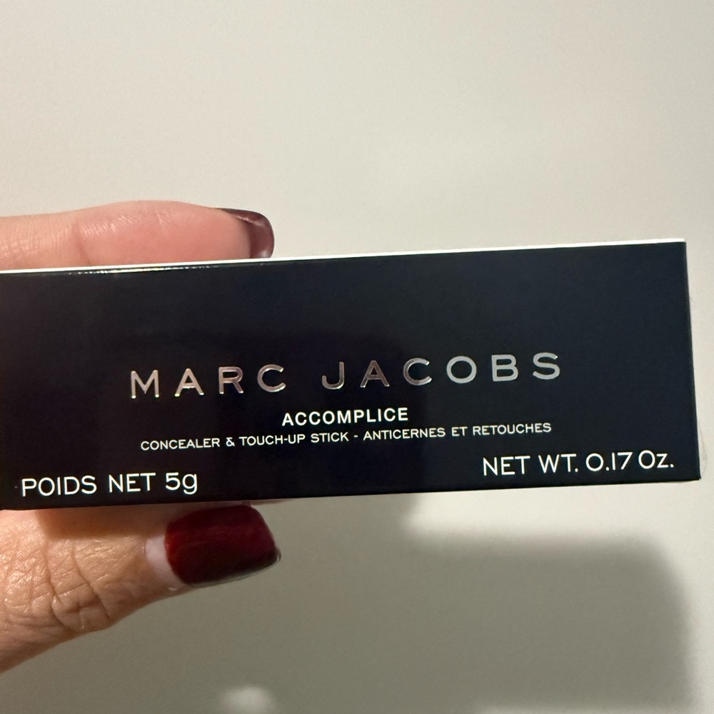 Marc Jacobs accomplice concealer in the shade Tan 49